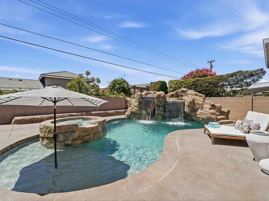 Saltwater pool and spa with rock waterfall